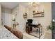 Comfortable office space with floating shelves and room for desk and storage at 9279 Merino Ct # D, Littleton, CO 80125