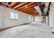 Unfinished basement featuring exposed beams and sealed walls, ready for customization at 42754 Calusa Pines Rd, Elizabeth, CO 80107