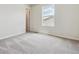 Bedroom with neutral carpet, one window, and a closet at 42754 Calusa Pines Rd, Elizabeth, CO 80107