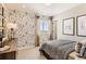 Stylish bedroom with music-themed wallpaper, window with blinds and a modern ceiling light at 42754 Calusa Pines Rd, Elizabeth, CO 80107