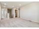 Hallway features neutral carpet, stairway, access to multiple rooms, and natural light at 42754 Calusa Pines Rd, Elizabeth, CO 80107