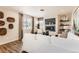 Comfortable living room with a sleek fireplace, modern decor, and large windows for natural light at 42754 Calusa Pines Rd, Elizabeth, CO 80107