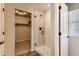 Sleek bathroom with glass enclosed shower, walk-in closet, and stylish tile design, adding modern elegance at 42754 Calusa Pines Rd, Elizabeth, CO 80107