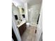 Modern bathroom with a glass-enclosed shower and updated fixtures, combining functionality with a clean and contemporary design at 4676 White Rock Cir # 12, Boulder, CO 80301