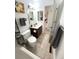 Tiled bathroom with a built-in cabinet under the sink and an adjacent toilet at 4676 White Rock Cir # 12, Boulder, CO 80301