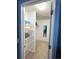 Organized walk-in closet with shelving and a full-length mirror, providing ample storage and a convenient dressing area at 4676 White Rock Cir # 12, Boulder, CO 80301