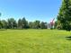 Well-maintained community with large open grassy area and mature trees offers scenic views at 4676 White Rock Cir # 12, Boulder, CO 80301