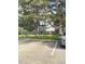 View of numbered parking spot in lot by a tree at 4676 White Rock Cir # 12, Boulder, CO 80301