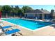 Enjoy the community pool with comfortable lounge chairs and a meticulously maintained pool house at 4676 White Rock Cir # 12, Boulder, CO 80301