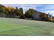 Community tennis court with net and green surface at 4676 White Rock Cir # 12, Boulder, CO 80301