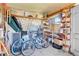 Organized storage shed interior with ample shelving for tools and equipment at 891 Ursula St, Aurora, CO 80011