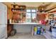 Functional shed interior with shelves and a workbench area, perfect for hobbies at 891 Ursula St, Aurora, CO 80011