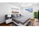 Well-lit bedroom with large bed, side tables, and stylish decor for relaxation at 16359 W 10Th Ave # X6, Golden, CO 80401