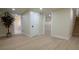 Open basement space with hardwood floors and natural light, perfect for entertaining at 2441 W 55Th Ave, Denver, CO 80221