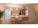 Bright, modern kitchen features sleek cabinetry, stainless appliances, and a stylish island with seating for casual dining at 2441 W 55Th Ave, Denver, CO 80221