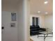 Living room featuring laundry hookups and a comfortable seating area at 2441 W 55Th Ave, Denver, CO 80221