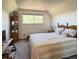 Upstairs bedroom with natural light and inviting decor at 4383 S Eagle Cir, Aurora, CO 80015
