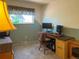 Bedroom with a desk and natural light. Perfect for a home office at 4383 S Eagle Cir, Aurora, CO 80015