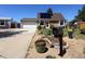 Charming home with solar panels, a landscaped yard, and an attached two-car garage at 4383 S Eagle Cir, Aurora, CO 80015