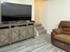 Relaxing living room featuring luxury vinyl plank flooring and comfortable seating at 4383 S Eagle Cir, Aurora, CO 80015
