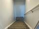 Carpeted staircase leading to upper or lower level of home at 4383 S Eagle Cir, Aurora, CO 80015