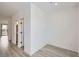 Clean, spacious bedroom with hardwood floors and ample natural light at 9662 Browns Peak Cir, Littleton, CO 80125