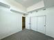 Spacious bedroom featuring neutral carpet and a large closet for ample storage space at 9662 Browns Peak Cir, Littleton, CO 80125