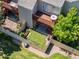 Aerial view of a private backyard with a deck, patio, and grassy area enclosed by a wooden fence at 1148 S Ventura Cir # C, Aurora, CO 80017