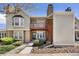 Charming two-story townhome featuring a private balcony, a brick chimney, and well-maintained landscaping at 1148 S Ventura Cir # C, Aurora, CO 80017