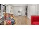 Spacious living area with hardwood floors, ample natural light, and convenient in-unit laundry at 1148 S Ventura Cir # C, Aurora, CO 80017