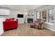 Inviting living room with a fireplace, hardwood floors, and comfortable seating area at 1148 S Ventura Cir # C, Aurora, CO 80017