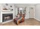 Cozy living room featuring a fireplace and hardwood floors, creating a comfortable atmosphere at 1148 S Ventura Cir # C, Aurora, CO 80017