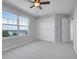 Bedroom with a water view and a closet with doors at 2485 Greensborough Cir, Highlands Ranch, CO 80129