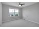 Bedroom with a view and a ceiling fan at 2485 Greensborough Cir, Highlands Ranch, CO 80129