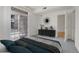 Main bedroom with access to patio and a view at 7440 S Blackhawk St # 101, Englewood, CO 80112