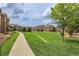 Community green space with walking path at 7440 S Blackhawk St # 101, Englewood, CO 80112