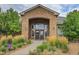 Attractive community entrance with stone facade and landscaping at 7440 S Blackhawk St # 101, Englewood, CO 80112