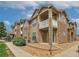 Building exterior with stone accents and balconies at 7440 S Blackhawk St # 101, Englewood, CO 80112