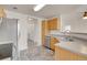 Well-equipped kitchen boasts stainless steel appliances and tile floors at 7440 S Blackhawk St # 101, Englewood, CO 80112