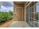 Private patio with storage and sliding glass door access at 7440 S Blackhawk St # 101, Englewood, CO 80112