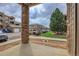 View from patio showing landscaping and building at 7440 S Blackhawk St # 101, Englewood, CO 80112