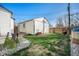 Backyard with manicured lawn and surrounding fence providing privacy and security at 9450 Lillian Ln, Thornton, CO 80229