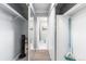 Hallway with mirrored closet doors and access to bathroom at 200 N Pearl St # 104, Denver, CO 80203