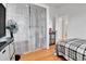 Cozy bedroom with hardwood floors and bright natural light at 2580 Valley View Dr, Denver, CO 80221