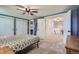 Bright bedroom with carpet flooring, closet with sliding doors and doorways to other rooms at 8144 W 81St Dr, Arvada, CO 80005