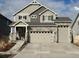 Charming two-story home with stone accents and a spacious two-car garage at 21901 E 42Nd Pl, Aurora, CO 80019