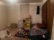 Bedroom featuring carpet flooring, natural light, and closet storage at 10885 Mildred Dr, Northglenn, CO 80233