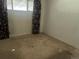 Bedroom featuring carpet flooring and natural light from surrounding windows at 10885 Mildred Dr, Northglenn, CO 80233