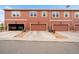 Townhome garages with convenient parking, and easy access to residences at 12704 Leyden St # D, Thornton, CO 80602