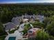 Areal view of the house featuring extensive outdoor living spaces and meticulous landscaping at 5 Mockingbird Ln, Cherry Hills Village, CO 80113
